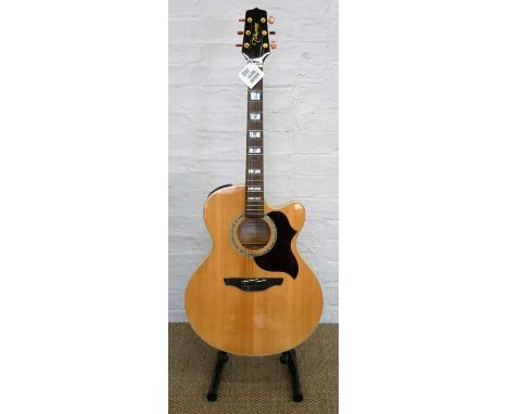 Takamine "EG523SC" Steel String Acoustic Guitar With jumbo sized cutaway body, flamed maple back and sides, pearl and abalone