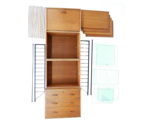 Staples & Co. Ltd., London Teak "Ladderax" Shelving System Circa 1970s, comprising two black-coated ladders for wall mounting