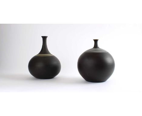 Frank W. Brookes for Wedgwood Two Basalt Bottle Vases Circa 1980, both decorated with concentric bands, one with gilt rim, bo