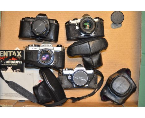 A Tray of Pentax SLR Cameras,  examples include MX, ME super, P30 and a K1000, with maker's cases and literature