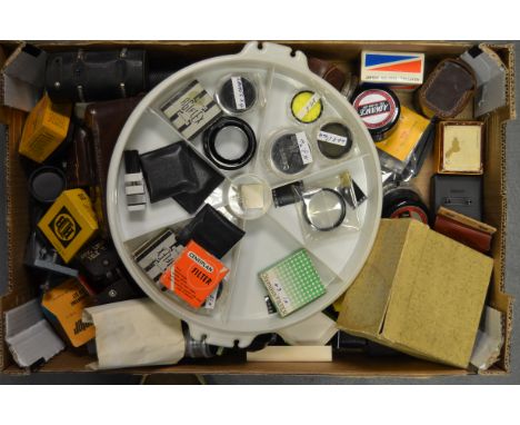 A Tray of Camera Parts and Accessories,  including a Rolleiflash extension in maker's box, an assortment of filters, lens hoo