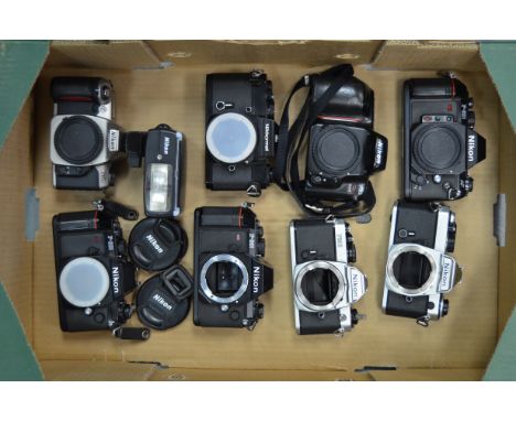 A Tray of Nikon SLR Bodies,  including a chrome Nikon FE, a black Nikkormat EL, a FM2, F-301 (2), F-501 and more