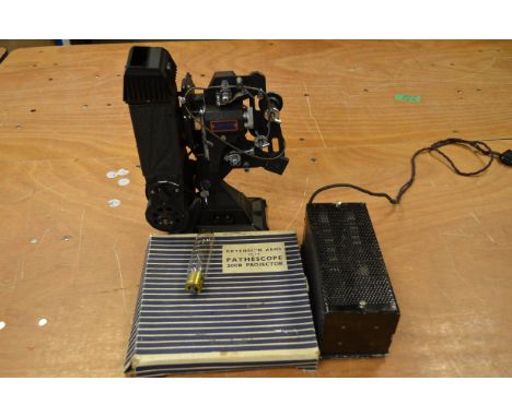 A Pathescope 200B 9.5mm Cine Projector, complete with lamps, power supply and extension arms