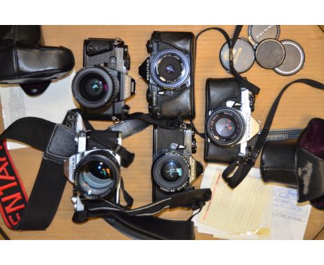 A Tray of Pentax SLR Cameras,  models include a K2 with a 135mm f/2.5 lens, a Super-A with 35-70mm f/4 zoom, ME super (2) wit