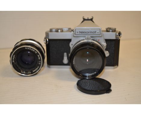 A Nikon Nikkormat FT SLR Camera,  chrome, shutter working, body, G, with a Nikkor 50mm f/2 lens and a Nikkor-H Auto 5cm f/2 l