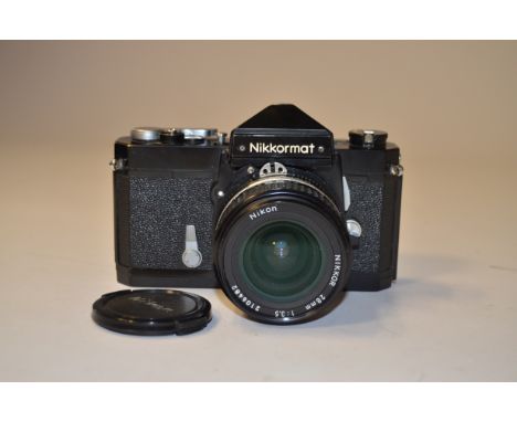 A Nikon Nikkormat FT SLR Camera,  serial no. 4450358, black, shutter working, body, F-G, small dent to prism and some brassin