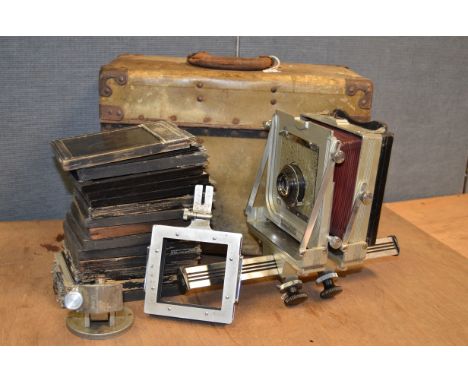 A Graflex Graphic View Mono Rail Camera,  5x4 inch plates, red leather bellows, body, F-G, age related marks, with a 203mm f/