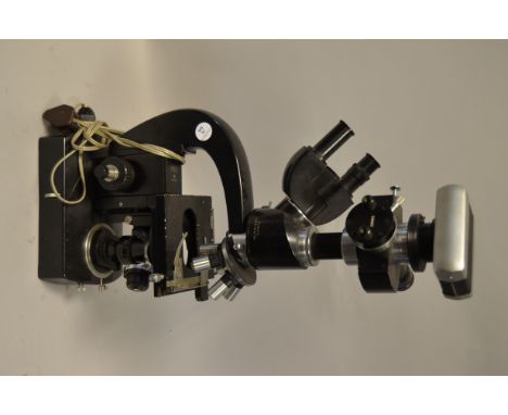 A Carl Zeiss Jena Bincocular Camera Microscope, with quintile nosepiece, mechanical stage, electric illuminant in black ename