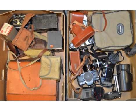 Two Trays of Cameras Including a Polaroid Land Camera Outfit, together with a selection of Praktica SLRs including PL and BCA