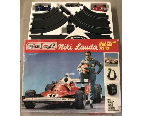 Polistil Niki Lauda slot car racing set A901 - c1977. Contains Ferrari 312 T2 and Elf Tyrell Ford. 1:32 scale. 