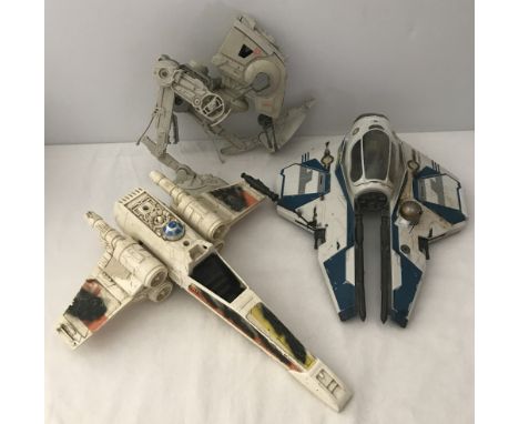 3 Star Wars vehicles. Aayla Secura Jedi Star Fighter Lucas films 2004, X wing fighter with smoke damage decal Kenner producti