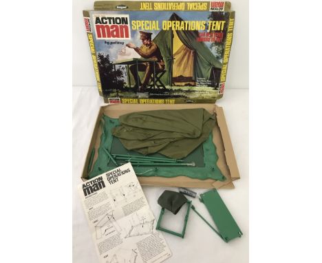 A boxed Action Man special operations tent. Comprising tent, table, chair, roll of maps and instructions leaflet. Stars to fr