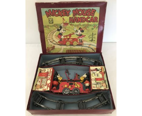 Wells Brimtoy scarce pre-war boxed Mickey Mouse Handcar set. c1930's set in very good condition, comprising 4 wheeled clockwo