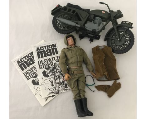 A vintage 1970's Action Man with dispatch rider outfit and accessories. Together with original motorbike ( no sidecar ). 