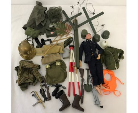 An original 1964 Palitoy Action Man together with assorted uniforms & accessories.  