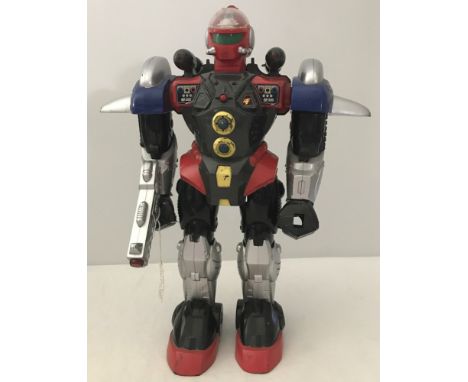 A vintage illuminated Fire Fire toy robot in red, grey and silver colours. With flashing lights, audio and laser gun. Approx.