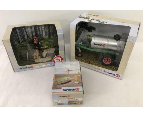 3 boxed Schleich model sets. Comprising #42041 water tanker, #40179 street scenery, and forestry worker with logs & chainsaw.