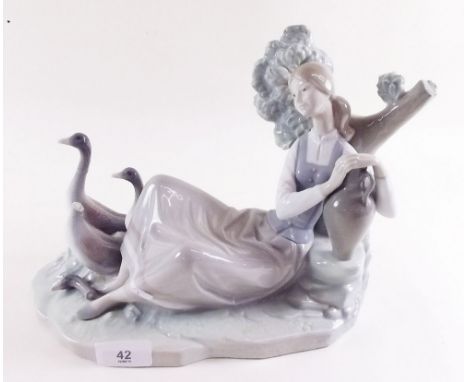 A Lladro group girl and geese, a/f
