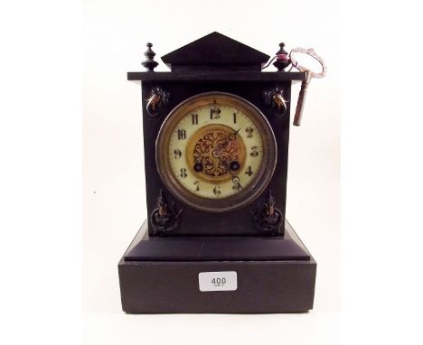A Victorian black slate mantel clock 