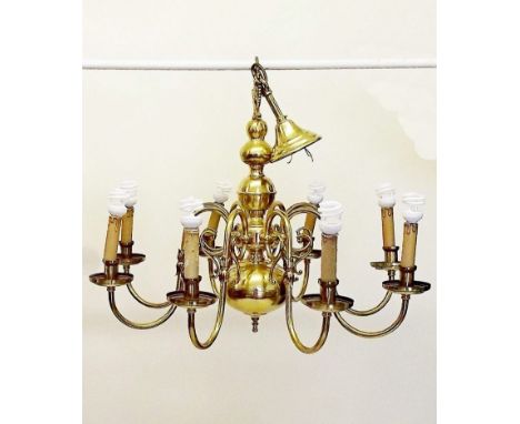 A large eight branch Dutch style brass chandeliers or light fittings