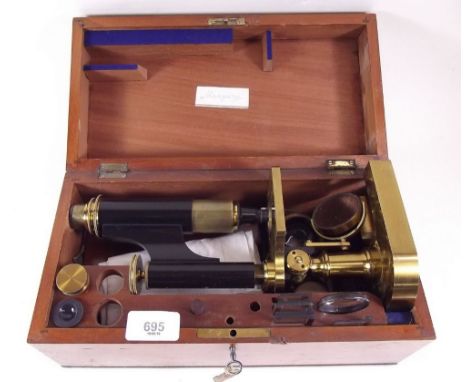 An R & J Beck monocular microscope London and Philadelphia, No 9134 with lenses and accessories in fitted mahogany case 