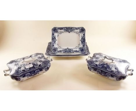 A Ford & Sons Flow blue dinner service 'Devon' comprising: two tureens, five breakfast plates, two tea plates, six dinner pla