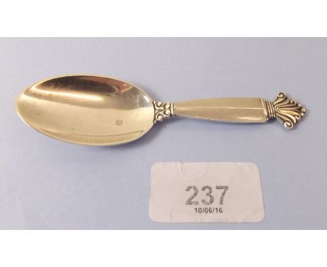 A Georg Jensen silver caddy spoon