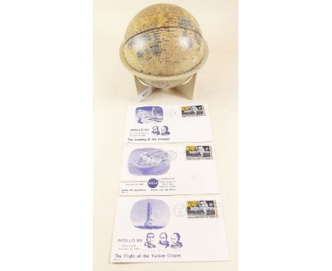 A moon landings globe and set of 1969 first day covers for Apollo XII