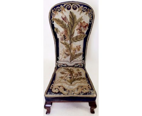 A Victorian pine dieu chair with original floral tapestry and blue velvet upholstery