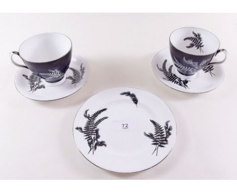 A Royal Albert 'Night and Day' tea service comprising: ten tea plates, four tea cups and eight saucers, four coffee cups and 