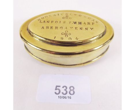 An Edwardian brass pocket snuff 'Roderick Morgan' T.Wharf, Lanfoist Abergavenny 1904