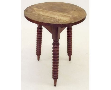 A Victorian pine occasional table on bobbin legs 