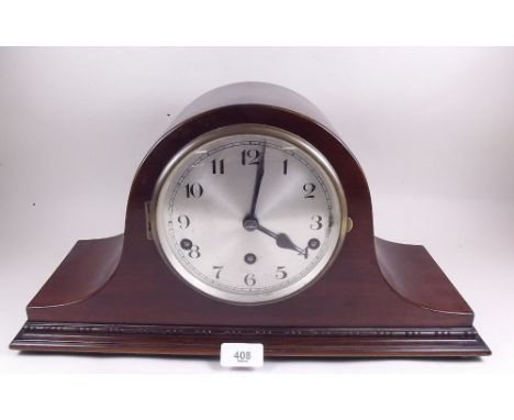 An arch top 1930's striking mantel clock