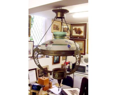 An Art and Crafts large brass light fitting with peacock feather glass shade, 98cm tall x 44cm 
