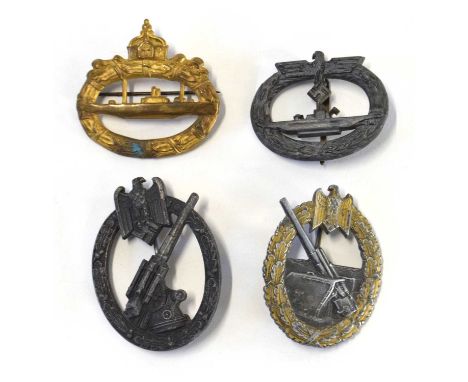 Quantity of four Third Reich possible reproduction award badges to include first world war gold U-Boat award, Second World Wa