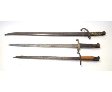 Three bayonets to include French model 1866 chassepot bayonet stamped U 97900 to scabbard and U 9799 to quillon cross guard, 