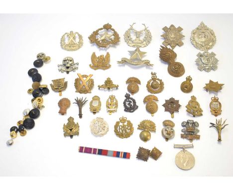 Quantity of cap badges to include: ER 2nd Queen Alexandras Royal Army Nursing Corps, Intelligence Corps, Royal Army Ordnance 