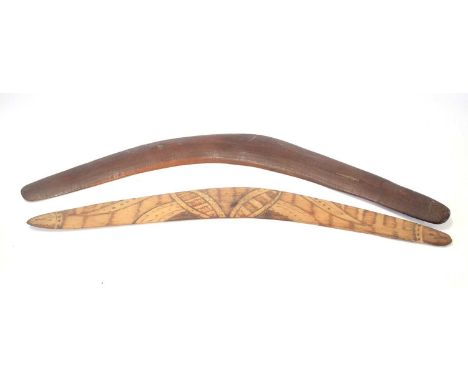 Two Aboriginal / tribal boomerangs. One example stamped to underneath ‘Aboriginal boomerang made from mangrove’ largest examp