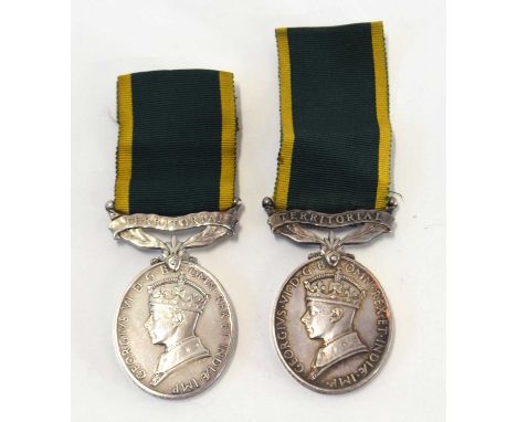 Two Second World War GRVI Territorial Efficiency medals, one impressed to 2049281 Gnr. T. R. Norton, R.A and further medal im