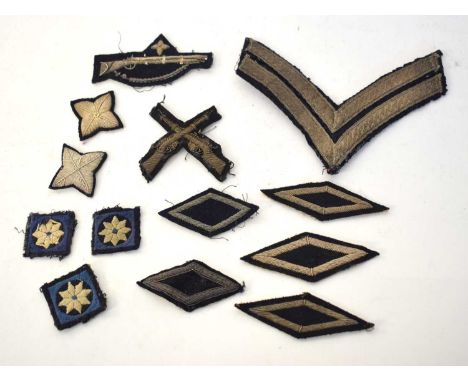 Quantity of Victorian silver bullion insignia and qualification patches to include corporal chevrons, marksman trade patch, s