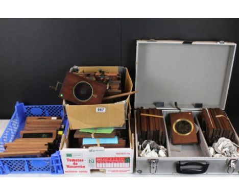 Collection of around 75 Victorian mahogany framed magic lantern slides to include over 40 cranked rotary examples (featuring 