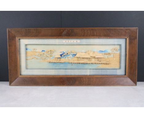 Early 20th century, Chinese landscape scene with pagoda, moulded in relief against a backdrop painted in watercolour, the rai