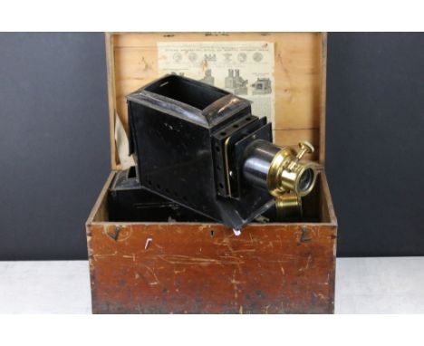 Pair of 19th century Newton &amp; Co of London black painted tinplate &amp; brass magic lantern projectors, with lenses &amp;