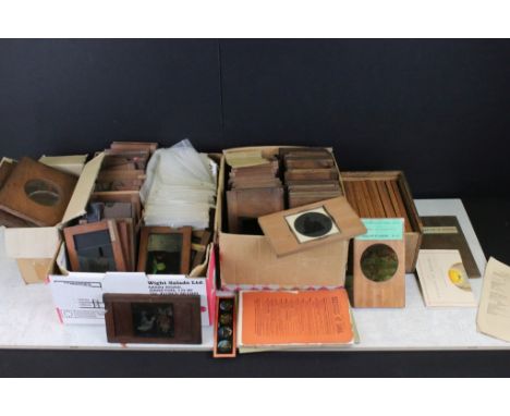 Four boxes of magic lantern slides in wooden slipper slide frames, subjects to include: Venice, Carnarvon Castle, The Jackdaw