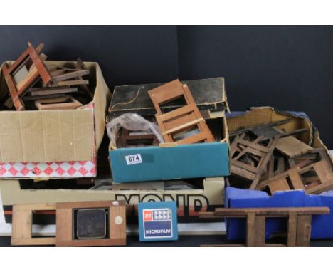 Collection of over fifty 19th century wooden magic lantern slide carriers &amp; frames, featuring a boxed Beard's Eclipse exa