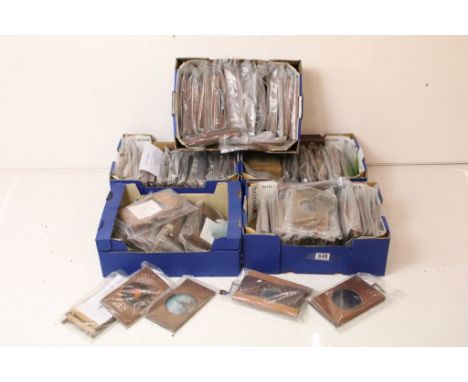 A very large collection of Rotary / crank handled magic lantern slides within wooden frames together with loose examples 