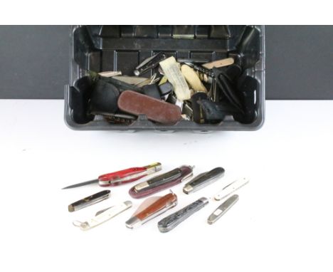 A large collection of penknives to include advertising examples together with multi-tools. 