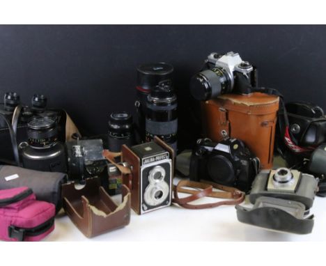 Collection of cameras and related equipment to include a Pentax ME super camera with a 35-70mm lens, tamron 80-250mm zoom mac