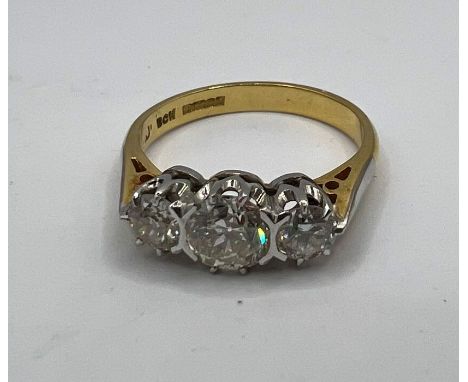 *****RE-OFFER £200 - £300*******&nbsp;

An 18 ct three stone diamond ring, claw set with three old European Cut diamonds, the