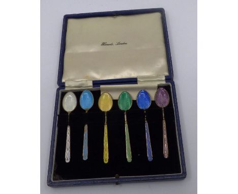 Boxed set of 6 silver and enamel coffee spoons , in a Harrods of London box , Hallmarked Birmingham 1963 , total weight 67 gr